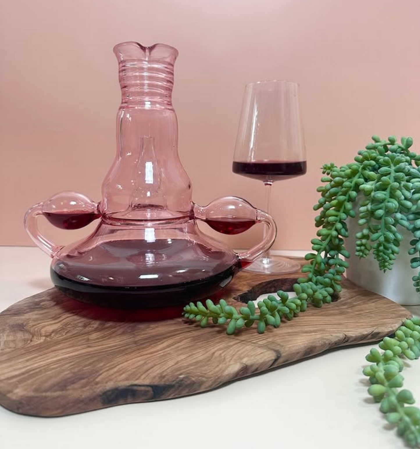 Shecanter, Hand-Blown Uterus Decanter.